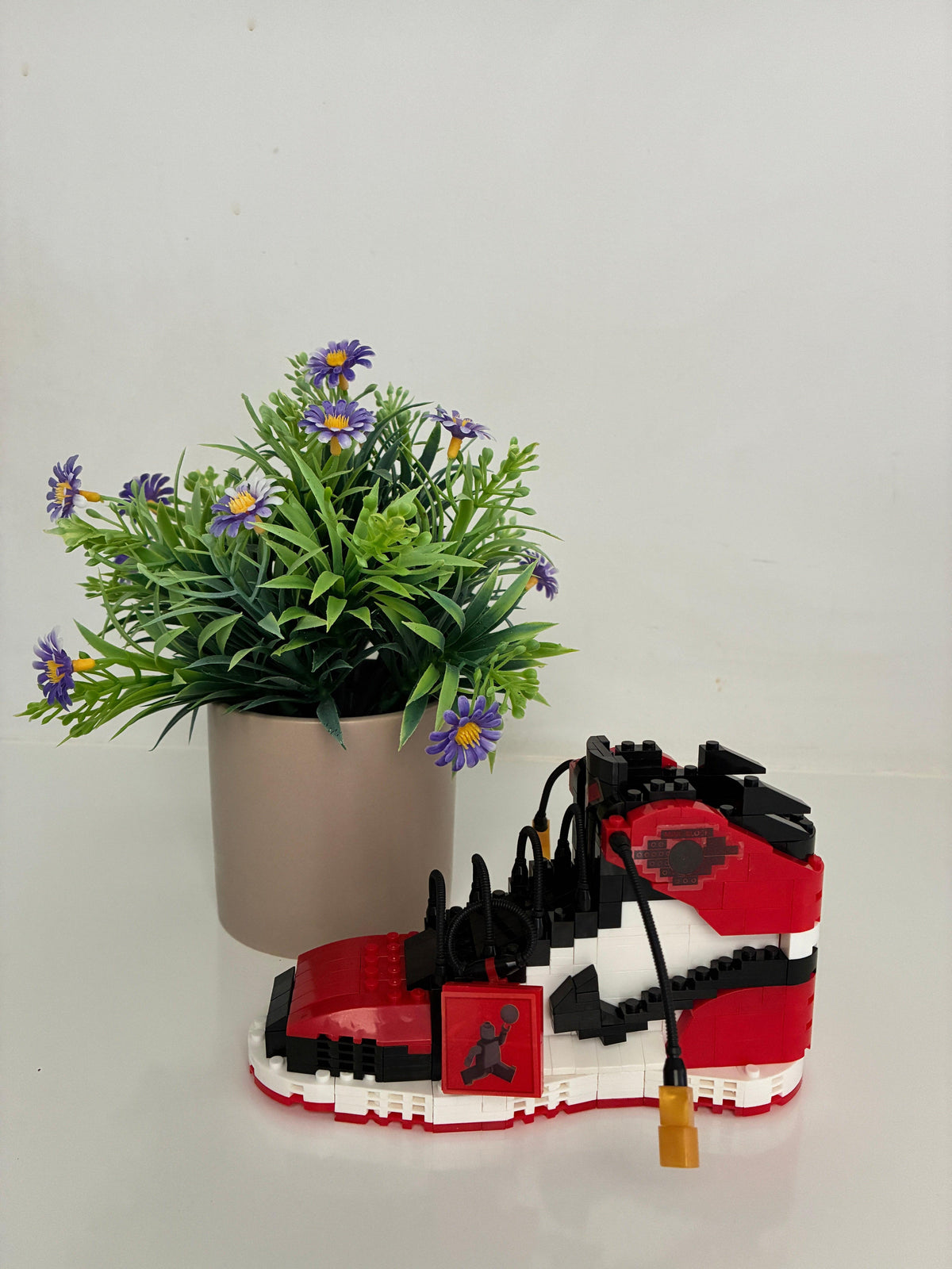Close-up detail of AJ Bred DIY sneaker building block pieces